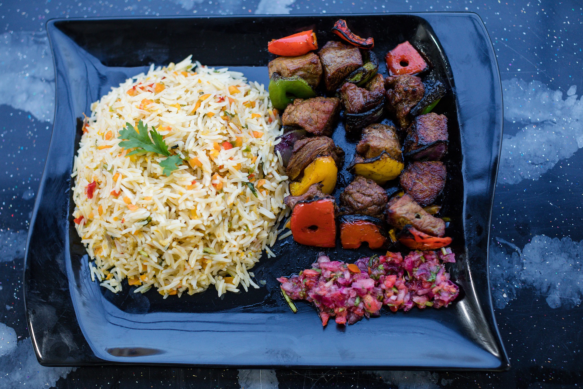 Square dish with rice and meat