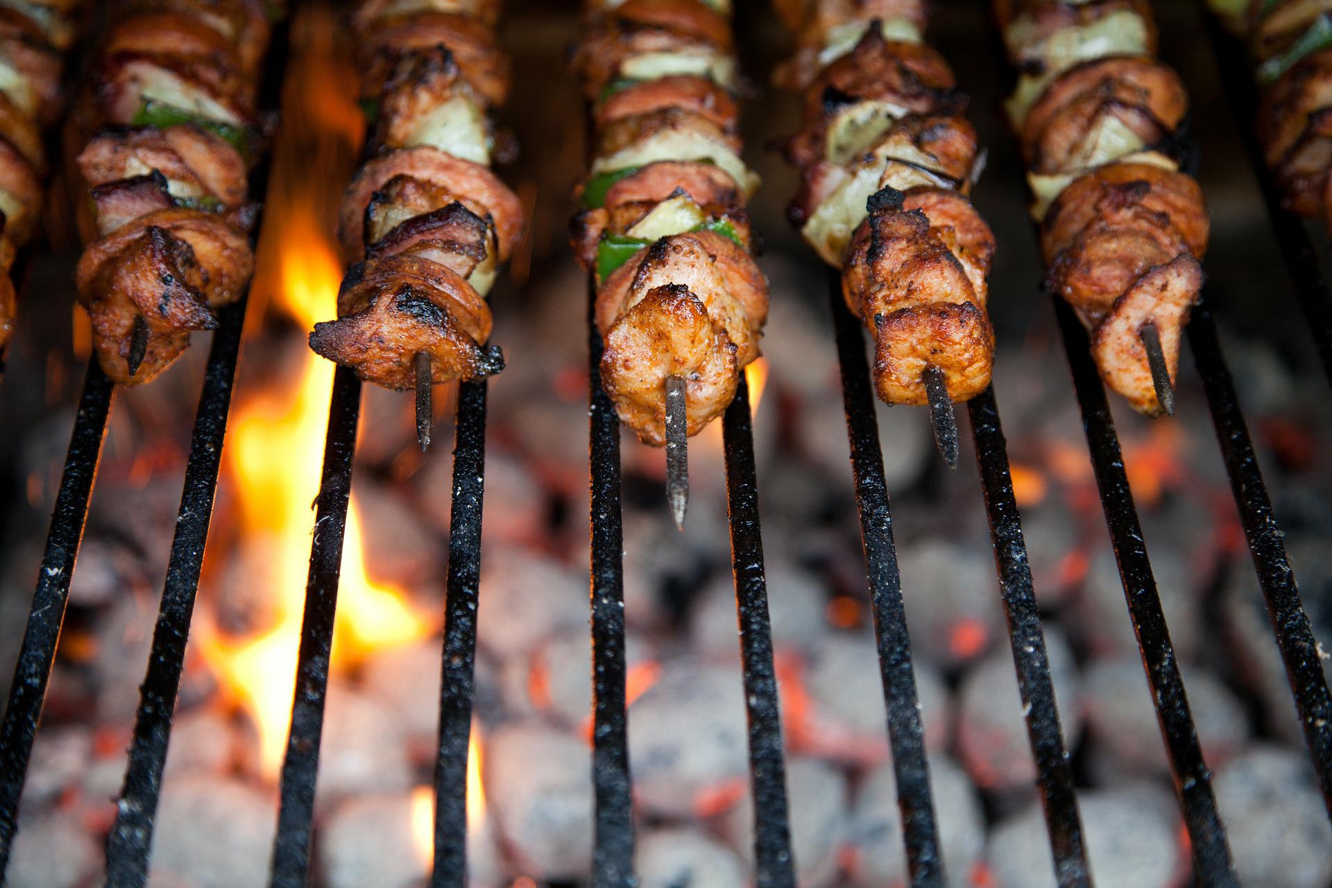 Skewers over grill